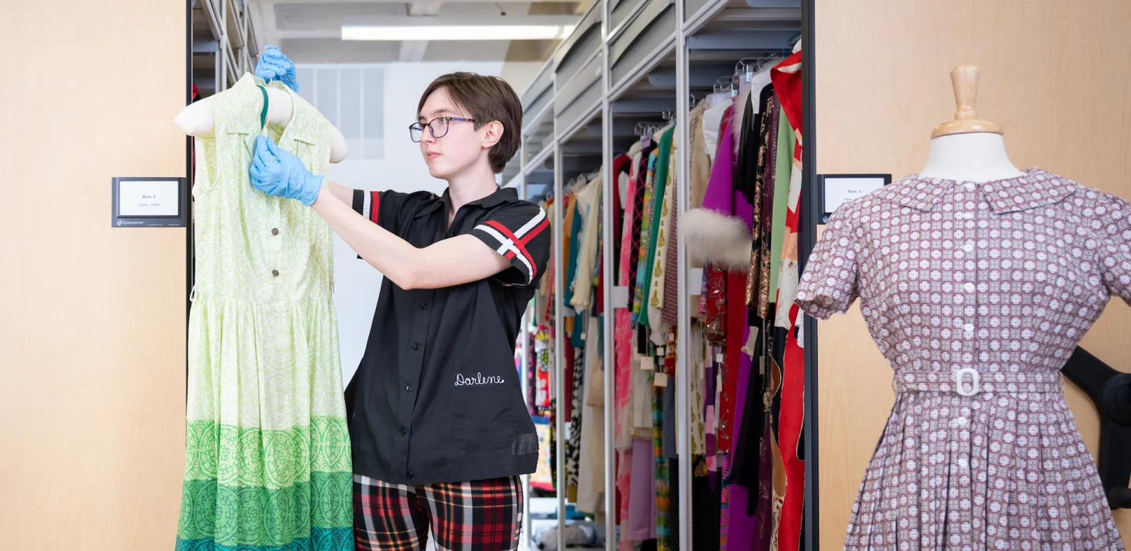 Student working the the Emily Reynolds collection.