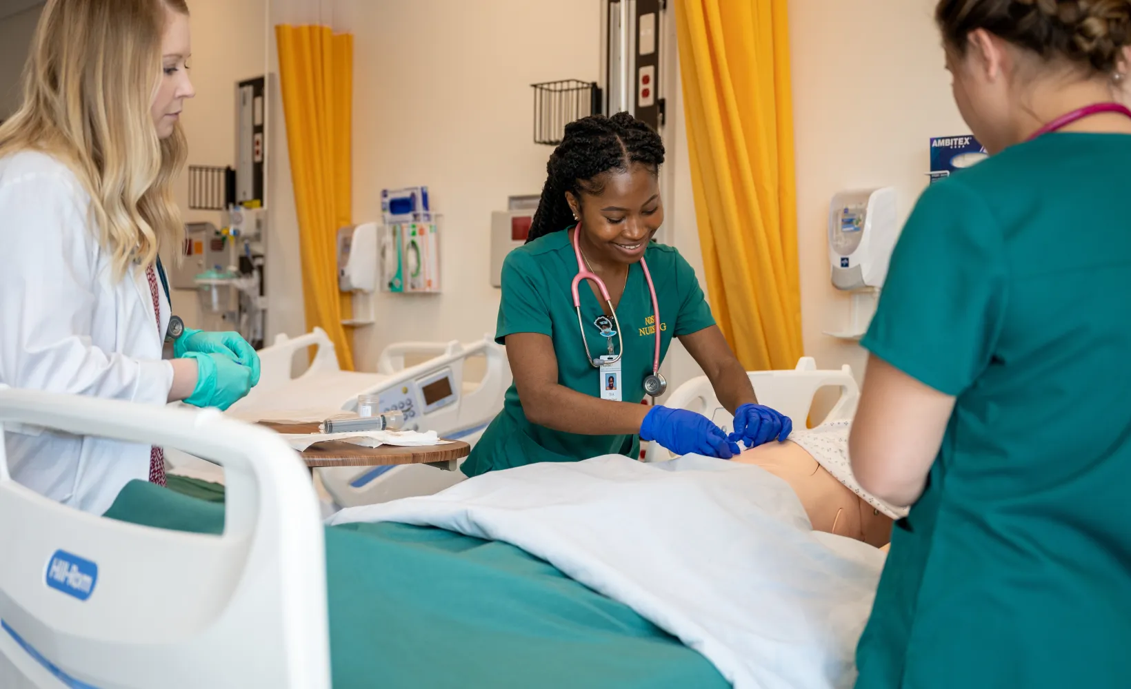 Image of students with patient
