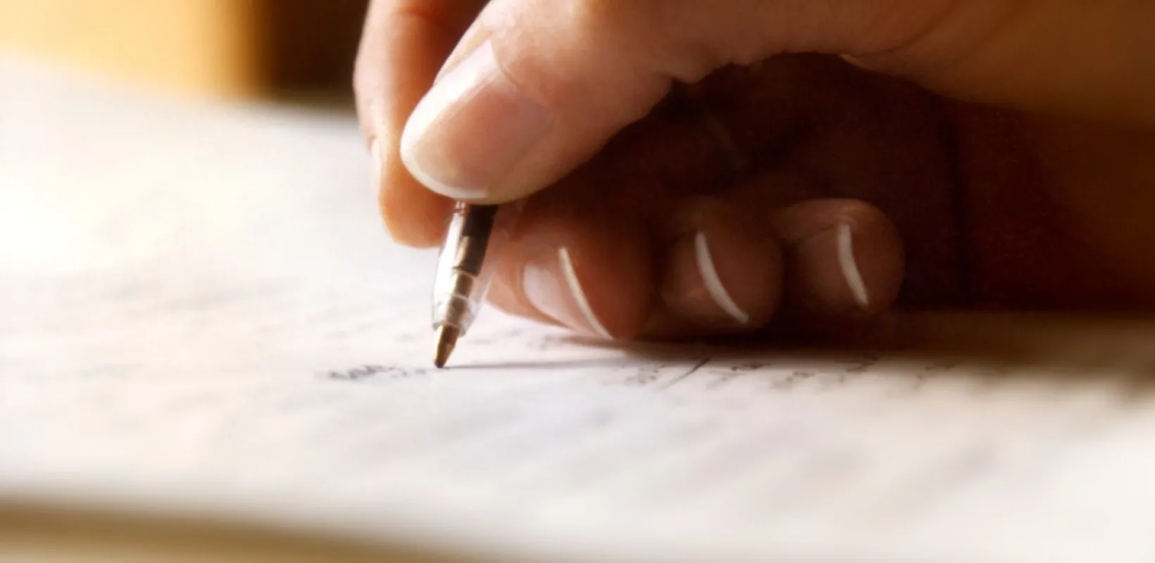 And hand writing with a ballpoint pen