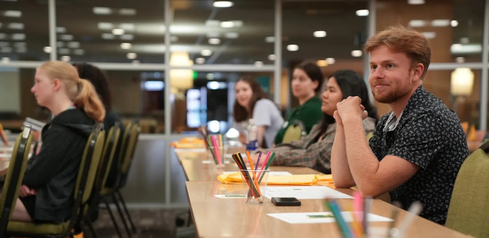 students at rows of tables