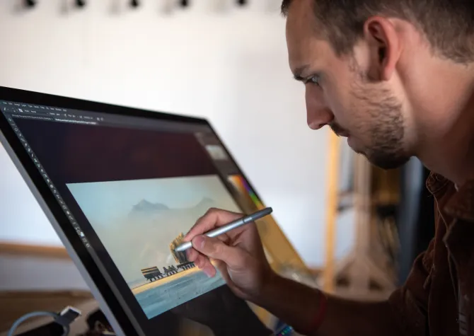 student drawing on a tablet screen