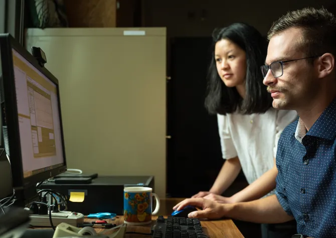 students at computer doing research as part of the Healthy Aging Lab