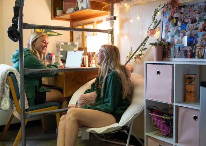 female students in dorm room 