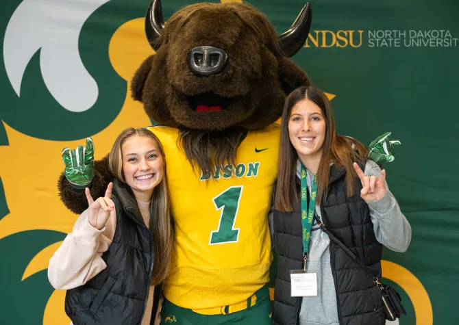 students posing for photo with Thundar