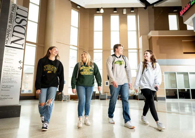 Students walking inside of Barry Hall