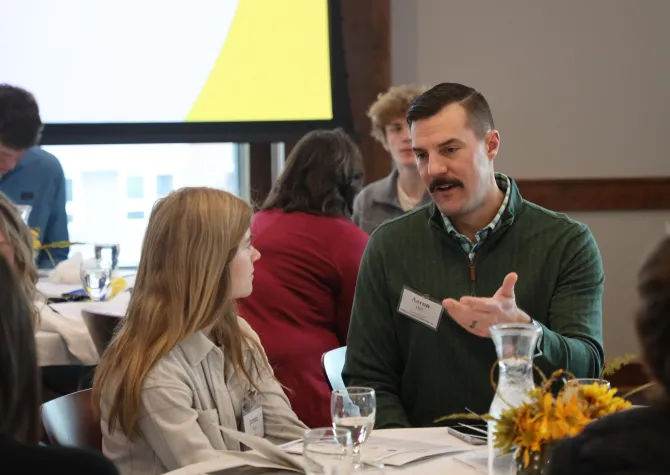 Mentor talking to a student