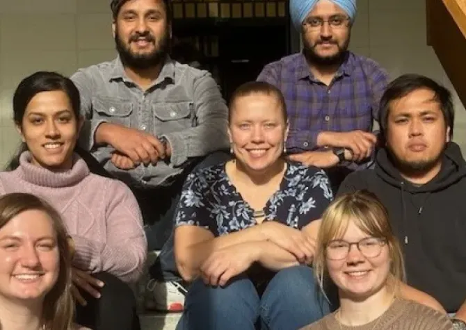 Plant Pathology Studetnts Sitting on Steps