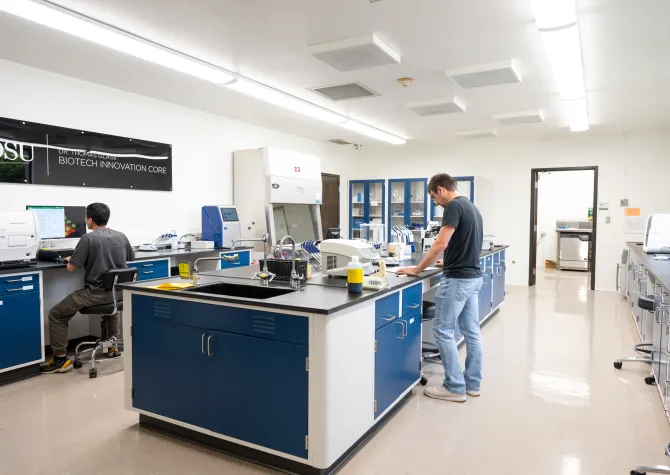 Students working in biotech innovation core lab