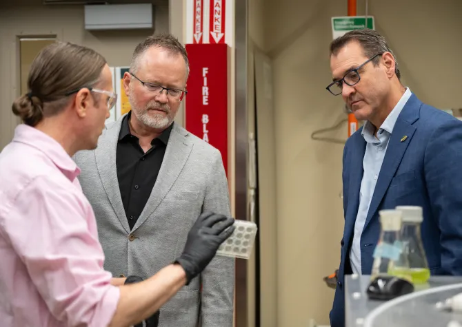 President Cook gets a tour of Coatings and Polymers