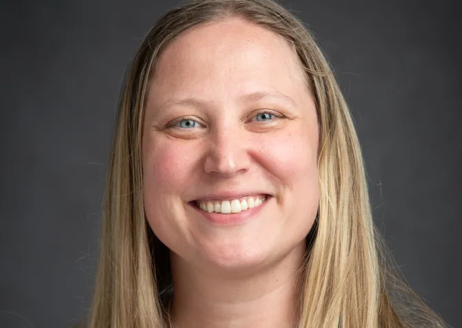 Dr. Anna Finley smiling at the camera