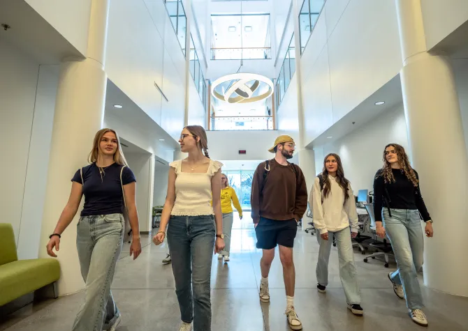 Students walking in STEM building