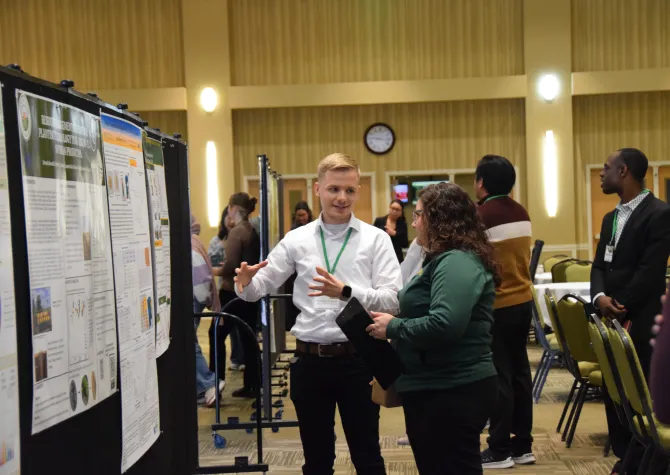 Student giving presentation at 2025 Soybean Symposium