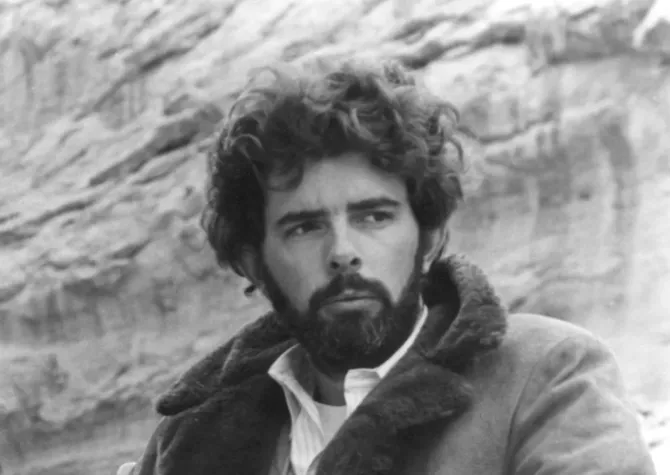 George Lucas looking confidently off to the side of camera.