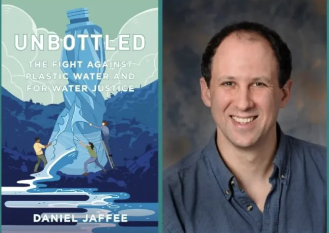 Man smiling at camera and book, Unbottled, pictured