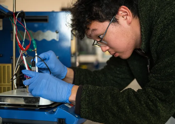 NDSU student Zuban Park performs an experiment in the chemistry lab