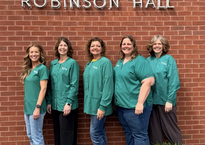 Vet Tech instructors in front of Robinson Hall