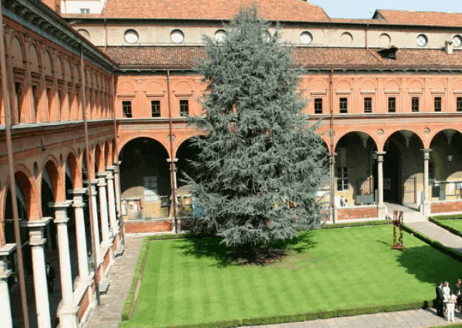The image of the historic cloistered courtyard (Cortile di Sant'Ambrogio) at the Università Cattolica del Sacro Cuore in Milan, Italy.