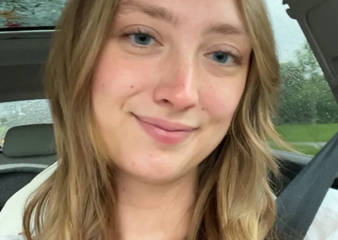 Morgan Gable, a blonde white woman, smiles at the camera