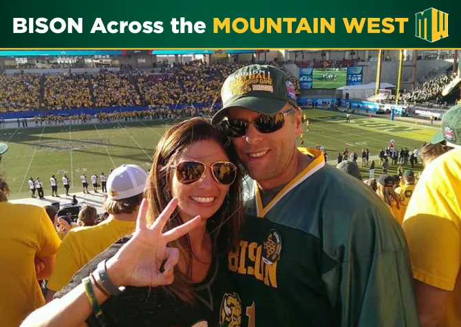 Rob Grosz and his wife Amy at a football game