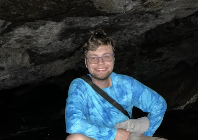 Camerson Kolthoff smiling confidently at camera.