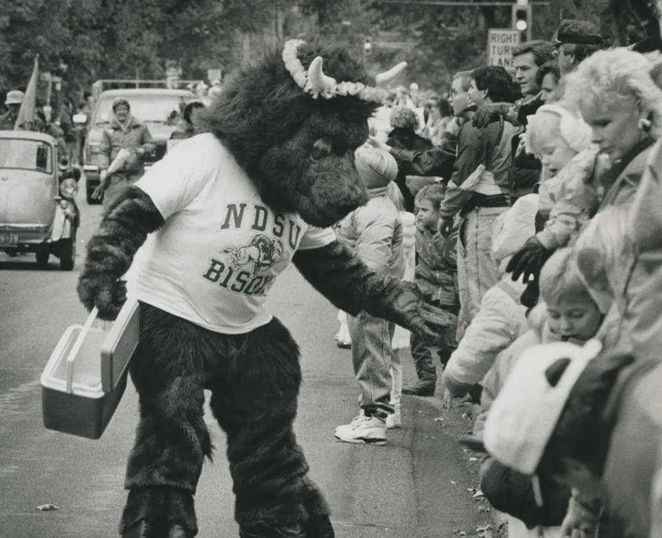 Thundar handing out candy during the 1991 homecoming parade