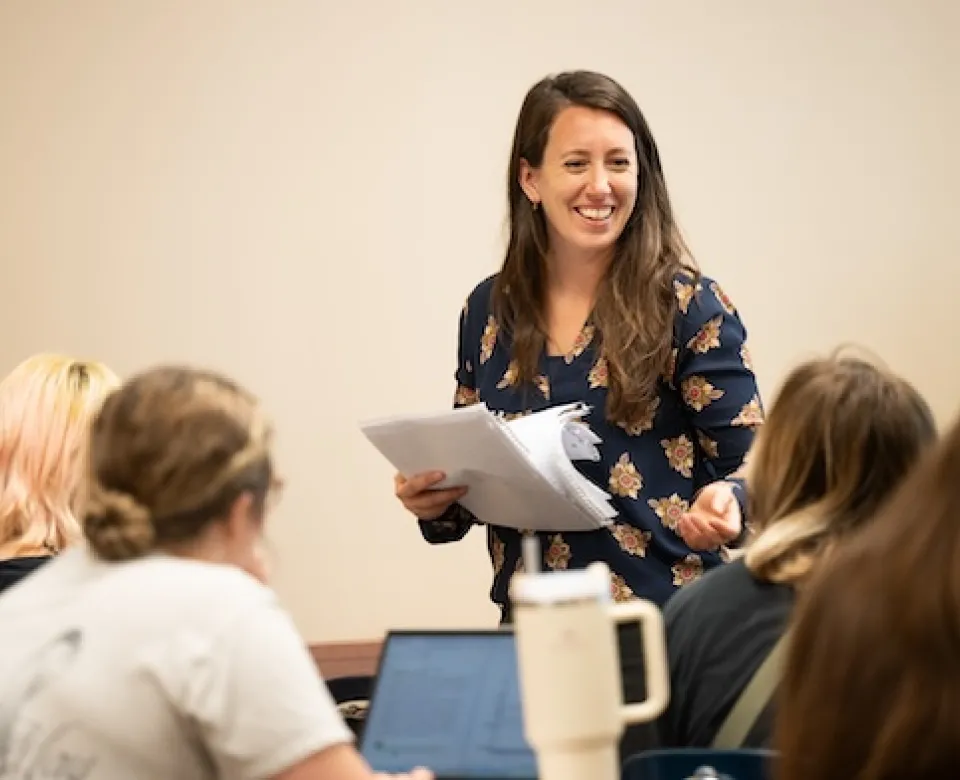 Amy Gore, assistant professor of English, teaching a class