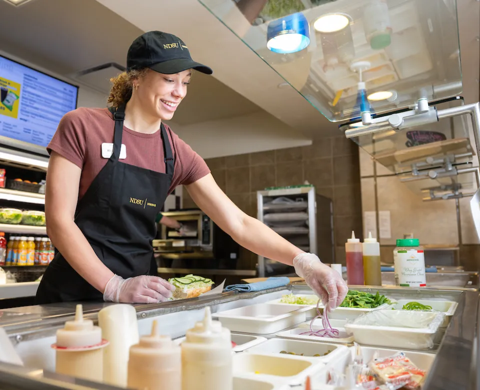 Student working in NDSU Dining