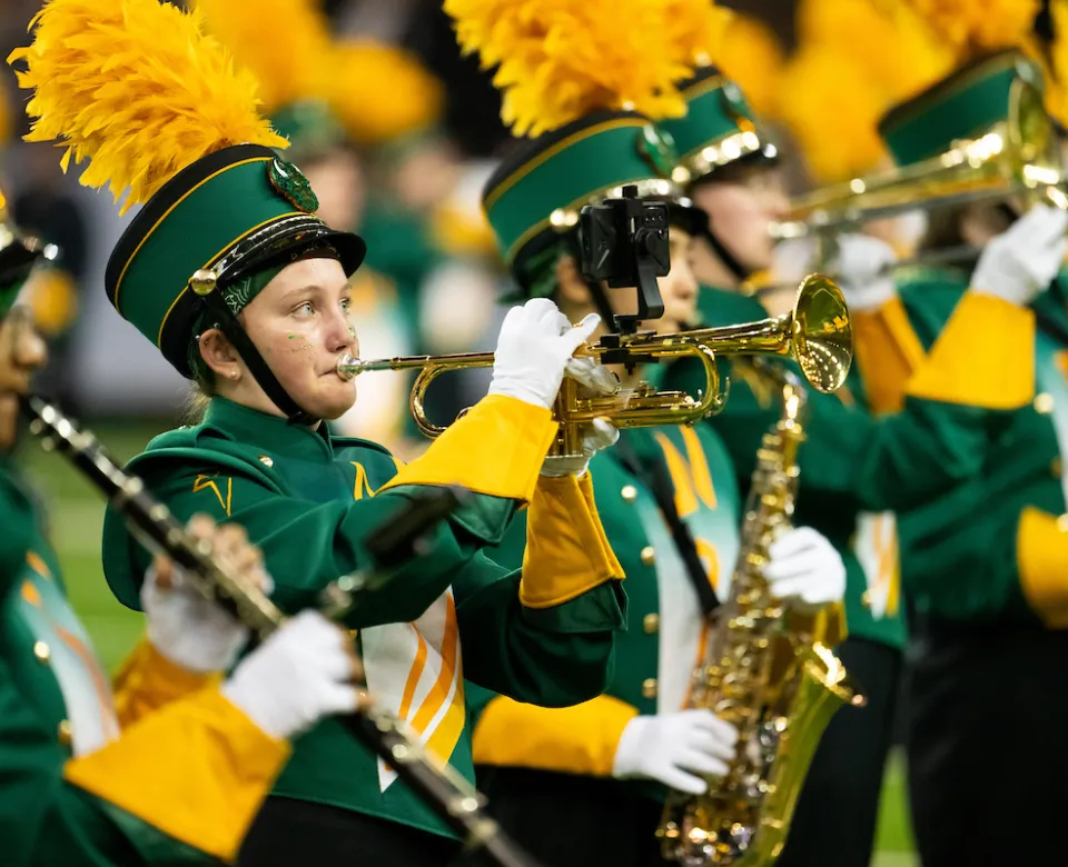 NDSU Gold Star Marching Band playing at a football game