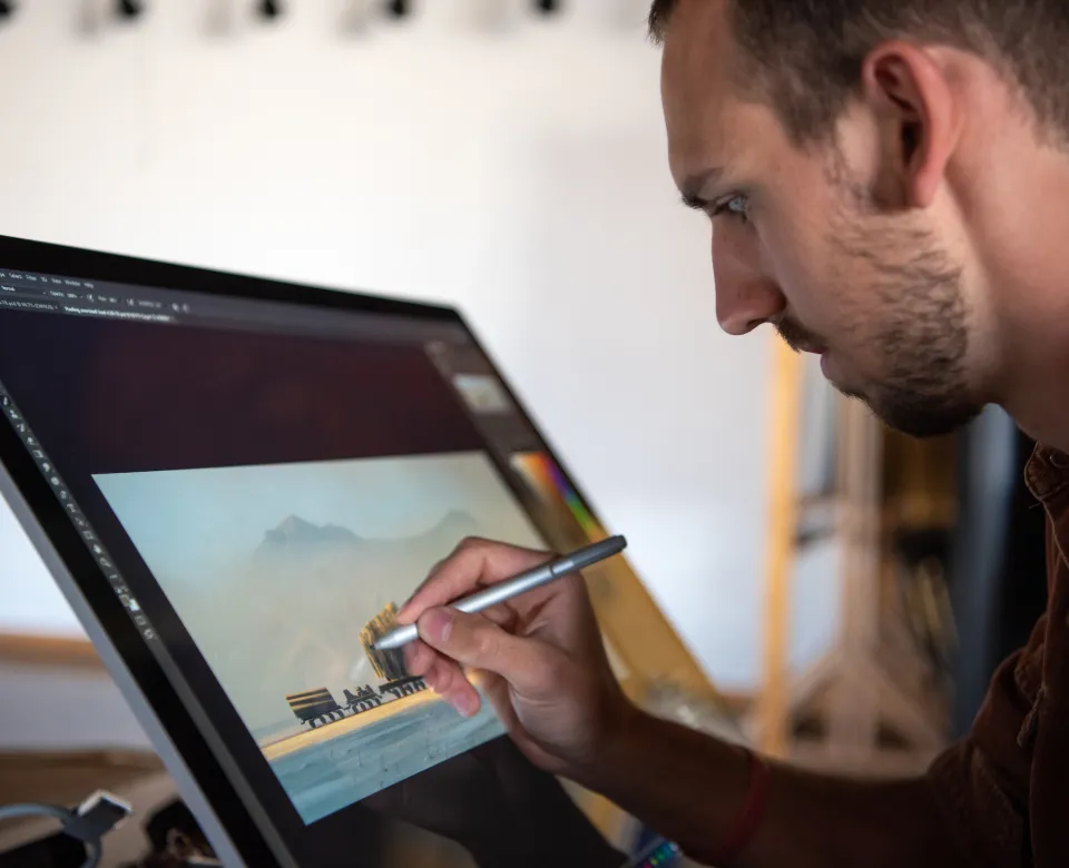 student drawing on a tablet screen