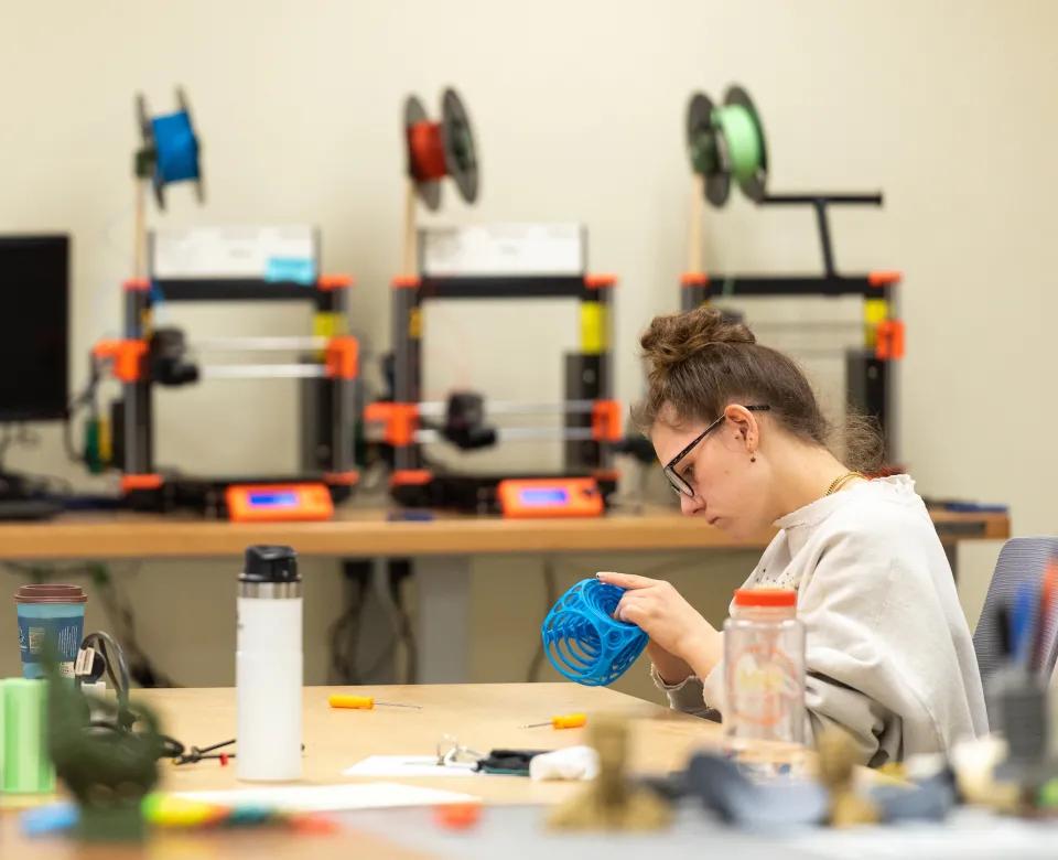 student working in the Library's Digital Fabrication Lab