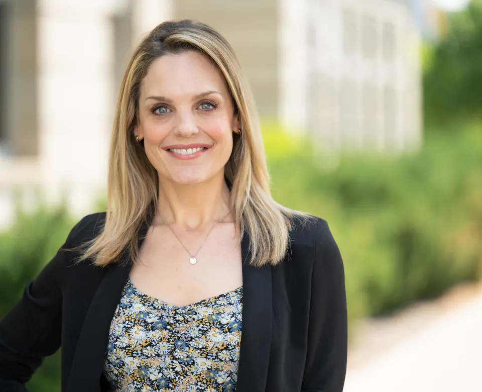 Elizabeth standing outside of Barry Hall