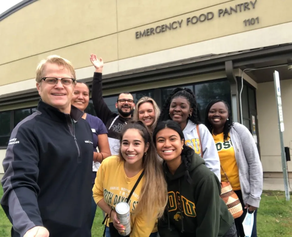 MPH students visiting the Emergency Food Pantry