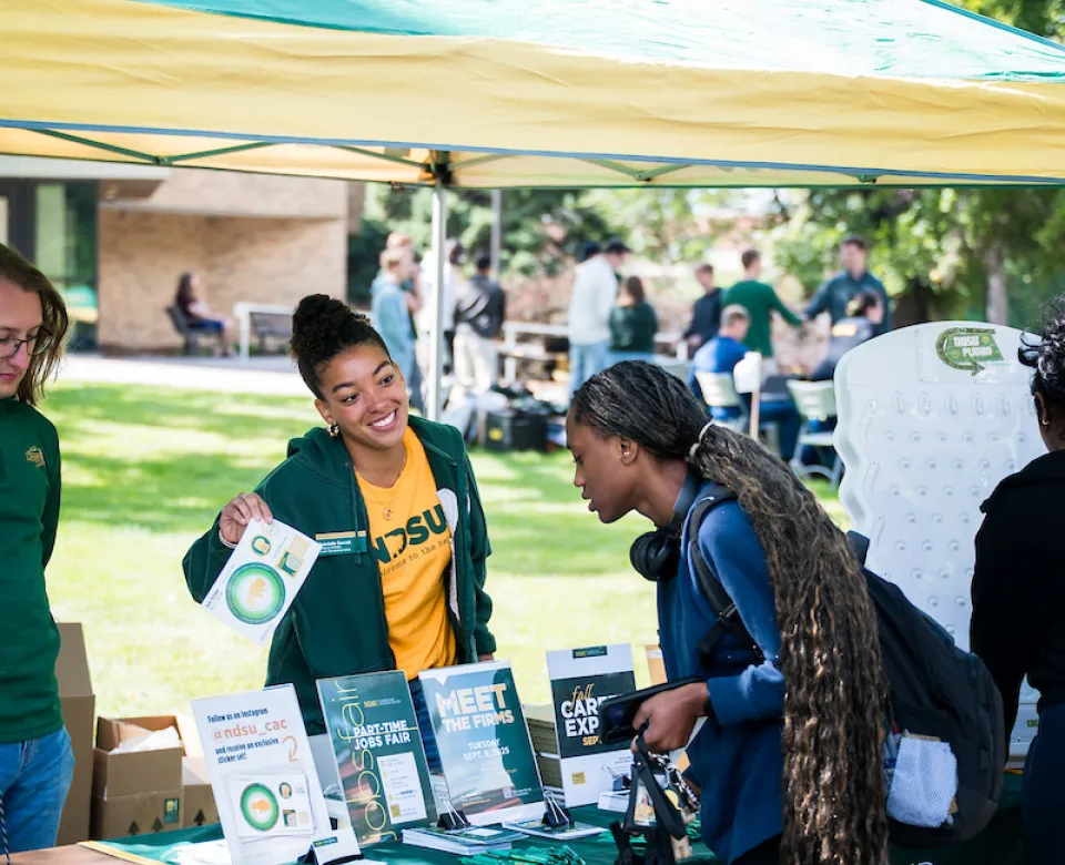 students talking during the Student Involvement Expo