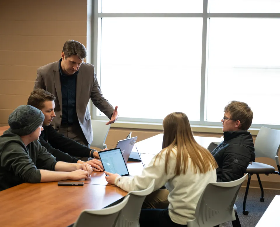 faculty with students