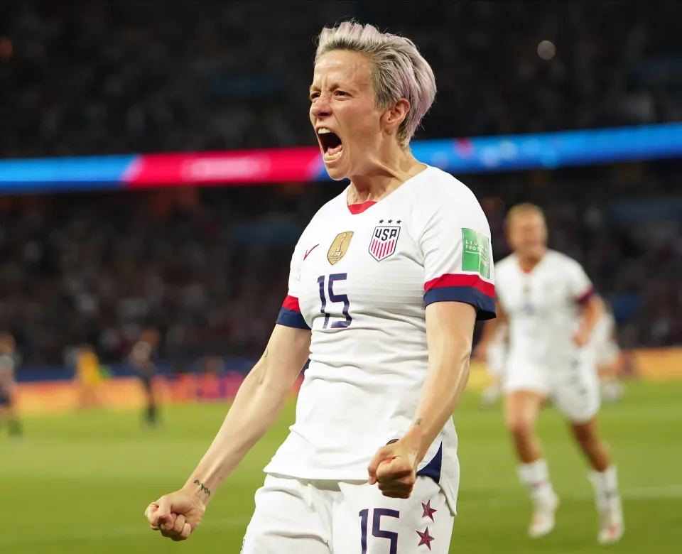 woman soccer player screaming excitedly off camera