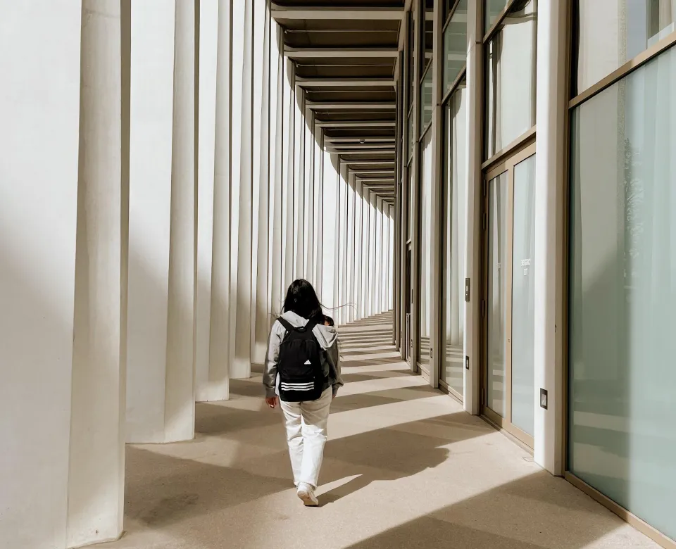 Student walking through hallway