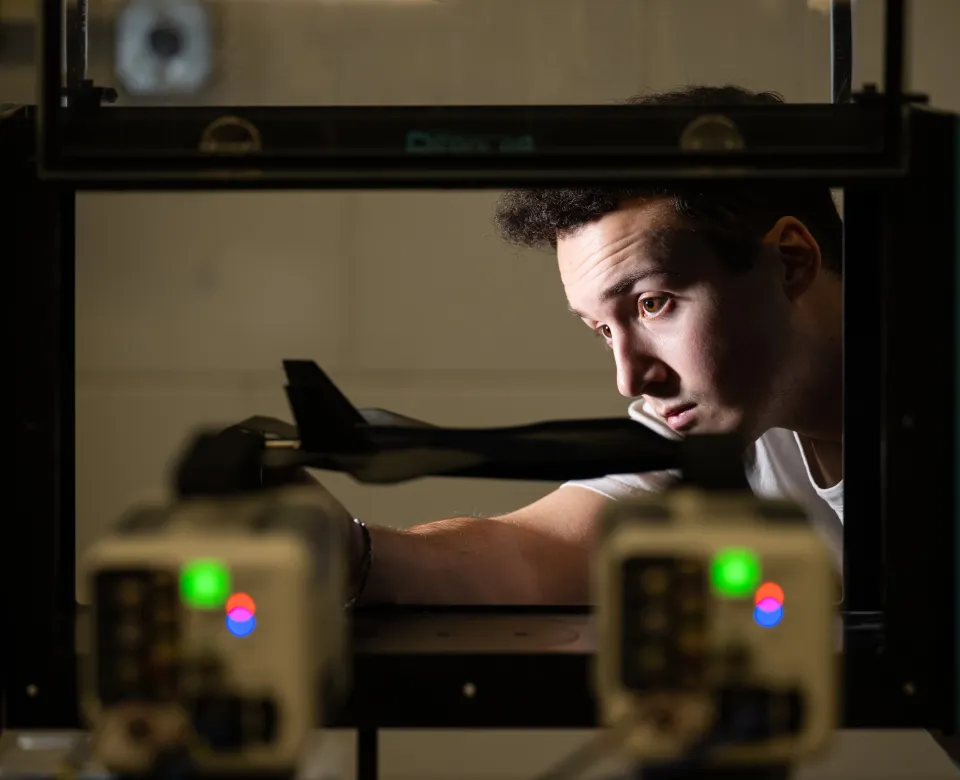 An NDSU student works in a lab space