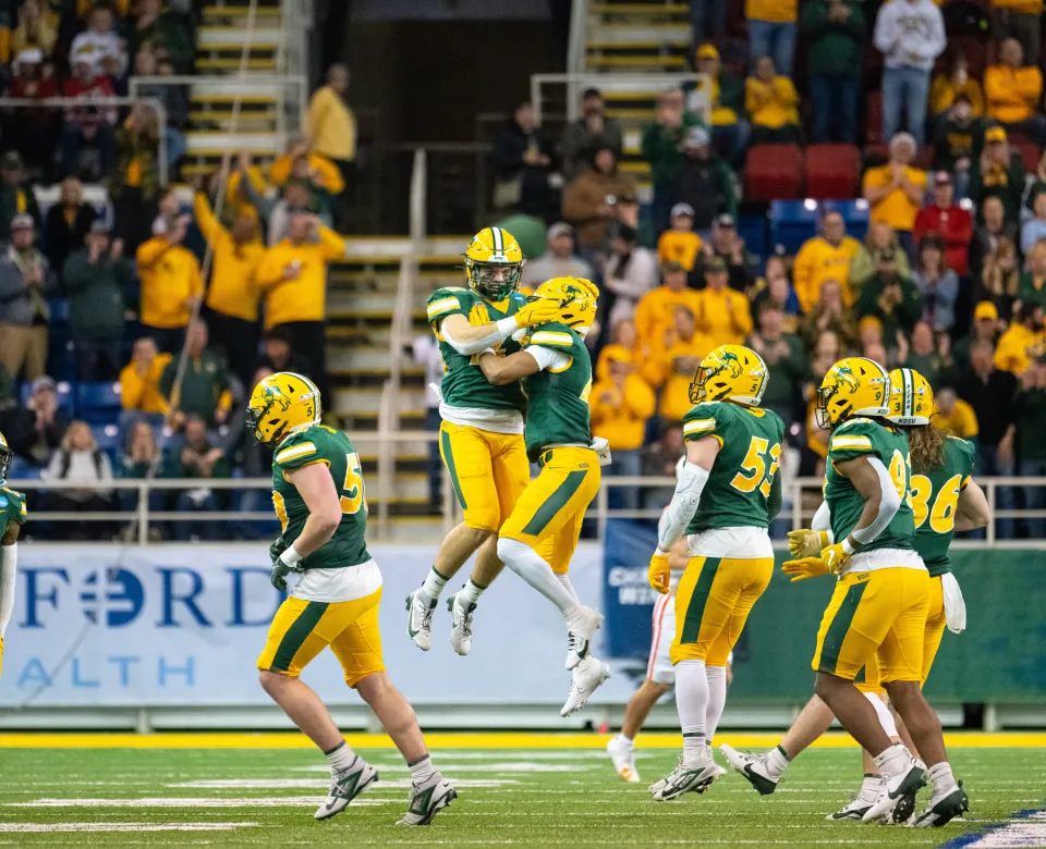 NDSU Football players celebrate after a touchdown