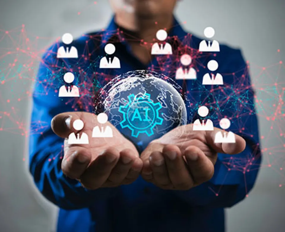 Person holding a small crystal ball with an AI symbol in it and figures of people around it