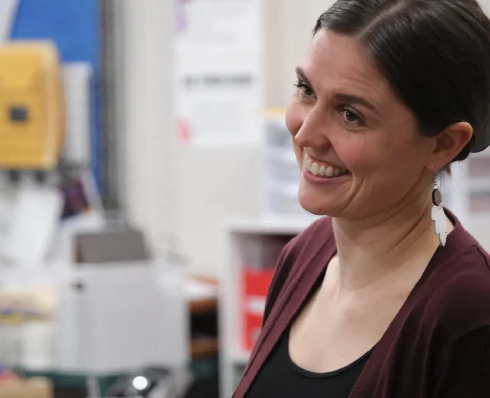  Katelyn smiling confidently in classroom