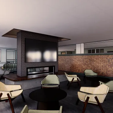 Lounge lobby with a variety of chairs for seating and a floor to ceiling fireplace