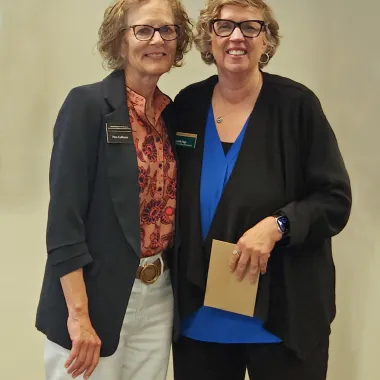 Pam Gulleson with Lynette Flage, retiring Associate Director, NDSU Extension