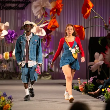 Two models wearing short outfits.