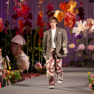 Model wearing jacket and pants.