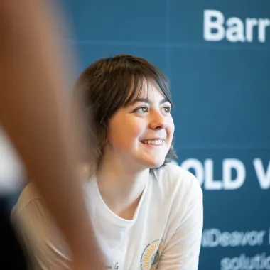 NDSU Honors cohort member Addison Grayson smiles while at NDeavor Barry D. Batcheller Tech Park.