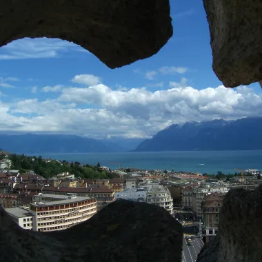 View of Switzerland through an opening in a wall.