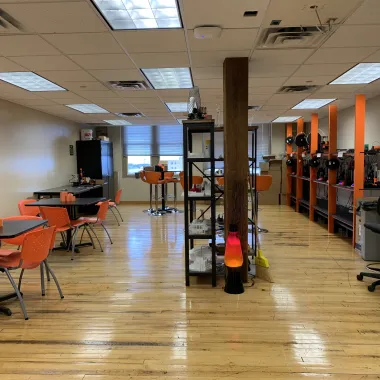 LAAVA lab with tables, chairs and computers.