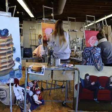 Art and art students in painting studio.