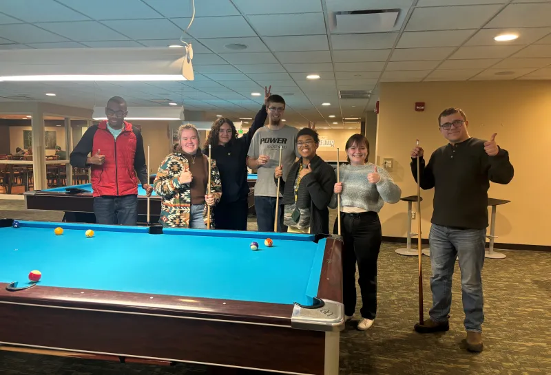 students playing pool