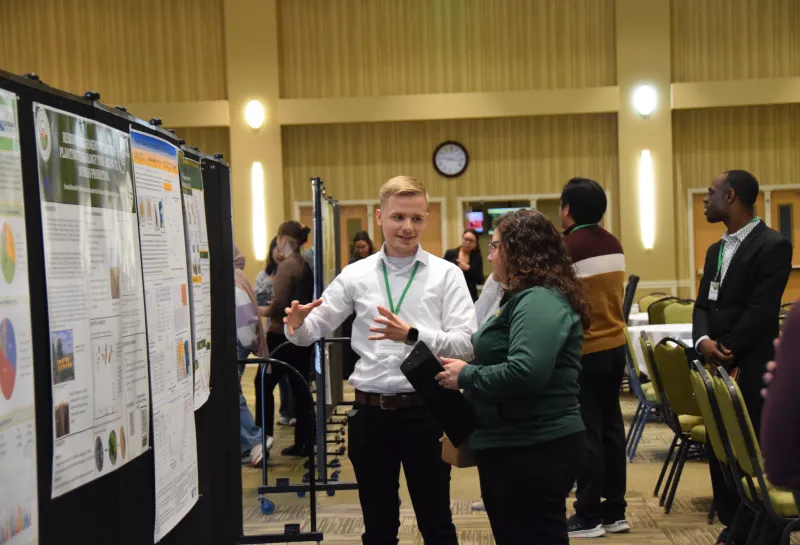 Student giving presentation at 2025 Soybean Symposium